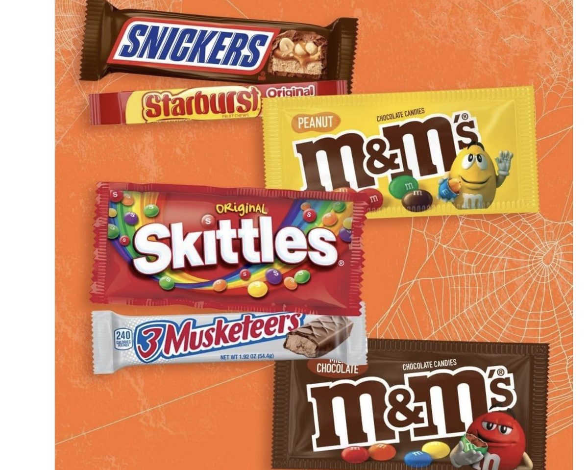 Assortment of snacks including crackers, nuts, trail mix, and protein bars
